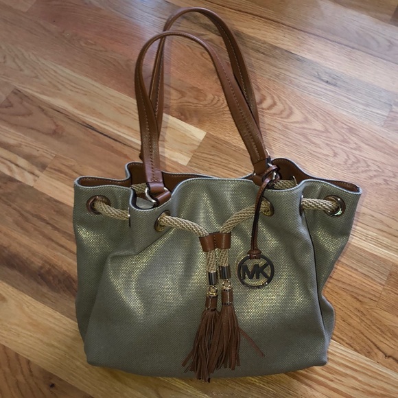Michael Kors Marina Drawstring Canvas Exterior Bags  Michael Kors
MARINA LARGE METALLIC GATHERED TOTE
